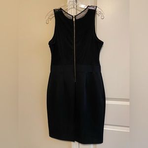 Black sleeveless dress with floral and mesh details. Size 12 $ 35.00